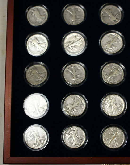 Collection of 25 Silver Walking Liberty Half-Dollars, In Presentation Case W COA