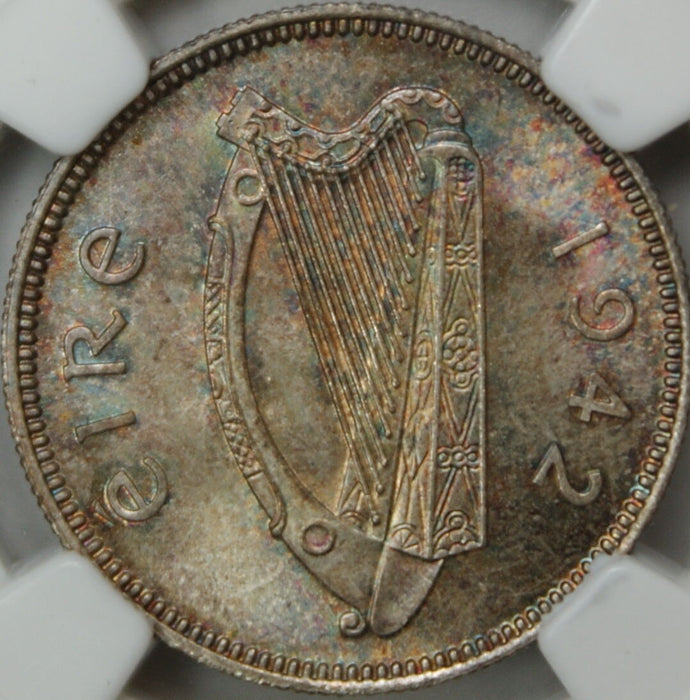1942 Ireland One Shilling, NGC MS-65, Toned