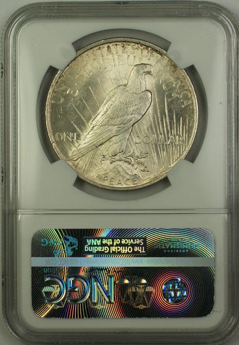 1924 Silver Peace Dollar $1 Coin NGC MS-63 Toned (15d)